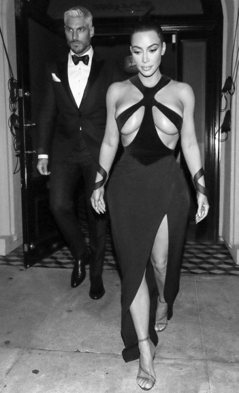 kim kardashian revealing dress in black and white